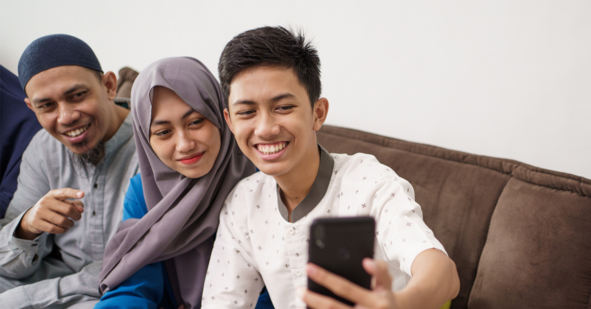Family on video call for parents' evening